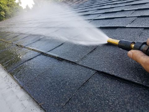 Roof shingles being washed